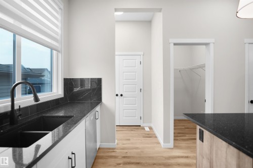 7100 51 Avenue, Beaumont, AB - Indoor Photo Showing Kitchen With Double Sink