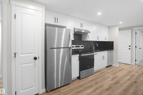 7100 51 Avenue, Beaumont, AB - Indoor Photo Showing Kitchen