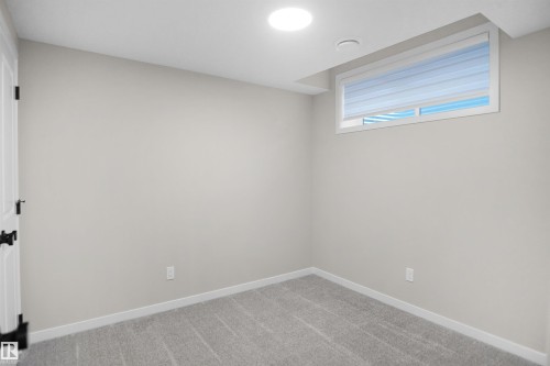7100 51 Avenue, Beaumont, AB - Indoor Photo Showing Other Room