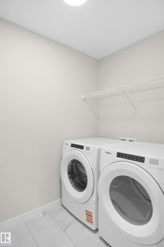 7100 51 Avenue, Beaumont, AB - Indoor Photo Showing Laundry Room