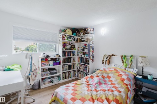 Additional content - 9059 52 Street Nw, Edmonton, AB - Indoor Photo Showing Bedroom