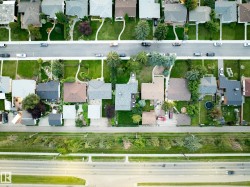 Residential development with established landscaping and paved roadways - 