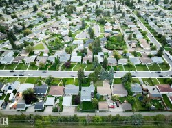Residential neighborhood with established landscaping and paved streets - 