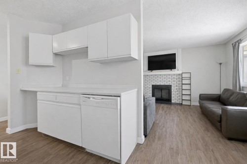 #302 6204 180 St Nw, Edmonton, AB - Indoor With Fireplace