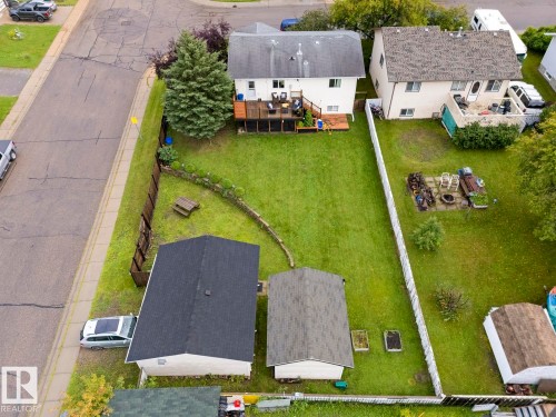 Expansive green lawn with rear fencing - 5330 43 Street, Cold Lake, AB - Outdoor
