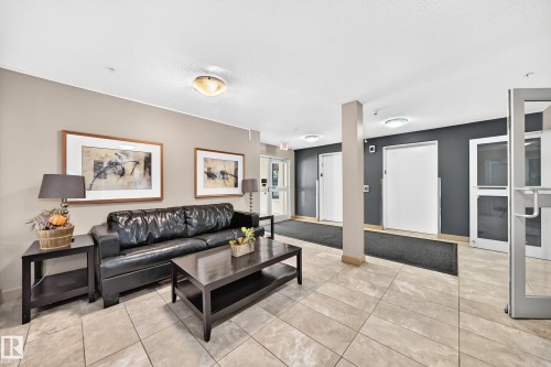 Tiled flooring throughout the common area - #216 17003 67 Av Nw, Edmonton, AB - Indoor