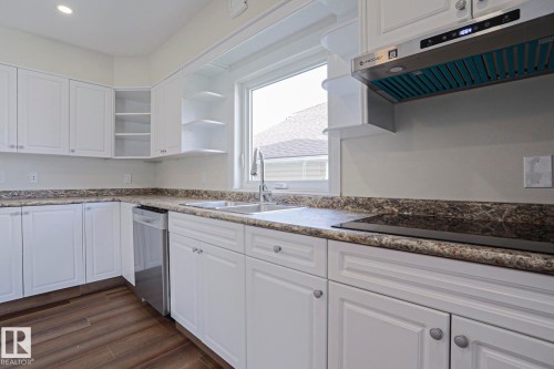 1028 James Crescent Nw, Edmonton, AB - Indoor Photo Showing Kitchen With Double Sink