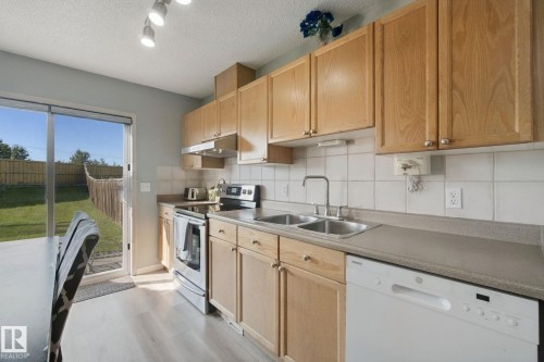 15730 141 Street Nw, Edmonton, AB - Indoor Photo Showing Kitchen With Double Sink