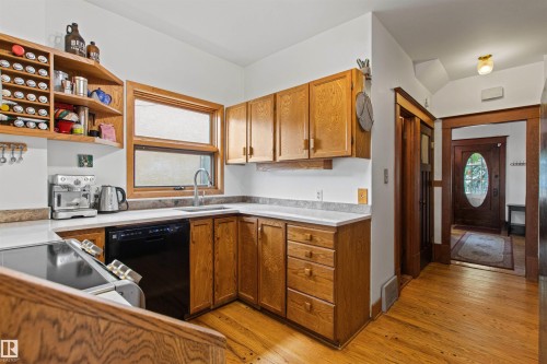10714 75 Avenue Nw, Edmonton, AB - Indoor Photo Showing Kitchen With Double Sink