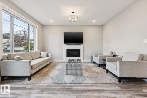 7758 Getty Wynd Nw, Edmonton, AB - Indoor Photo Showing Living Room With Fireplace