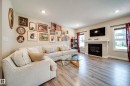 3632 Keswick Boulevard Sw, Edmonton, AB  - Indoor Photo Showing Living Room With Fireplace 