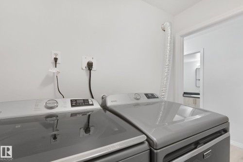 #101 7915 112 Av Nw, Edmonton, AB - Indoor Photo Showing Laundry Room