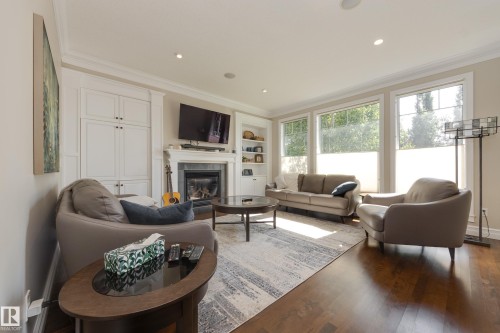 8 Lauralcrest Place, St. Albert, AB - Indoor Photo Showing Living Room With Fireplace