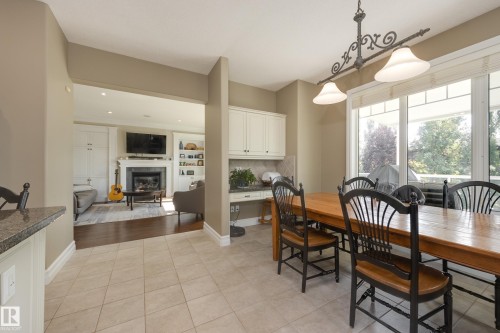 8 Lauralcrest Place, St. Albert, AB - Indoor Photo Showing Dining Room With Fireplace