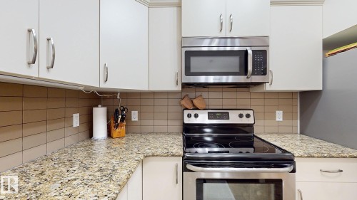 #313 511 Queen St, Spruce Grove, AB - Indoor Photo Showing Kitchen With Upgraded Kitchen