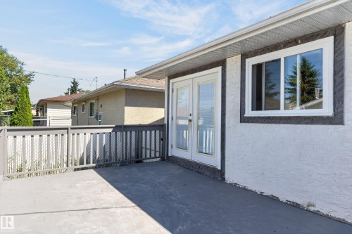 Exterior deck featuring a perimeter railing - 13214 123 Street Nw, Edmonton, AB 