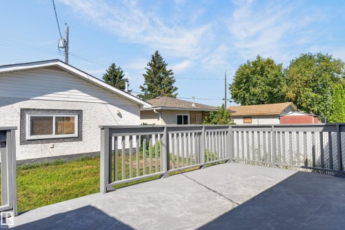 Expansive deck with grey painted railing - 13214 123 Street Nw, Edmonton, AB 