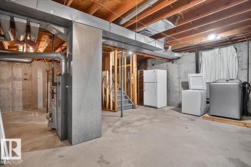 Concrete flooring and exposed ceiling joists - #47 3812 20 Av Nw, Edmonton, AB 