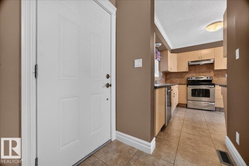 Tile flooring entry - #47 3812 20 Av Nw, Edmonton, AB 