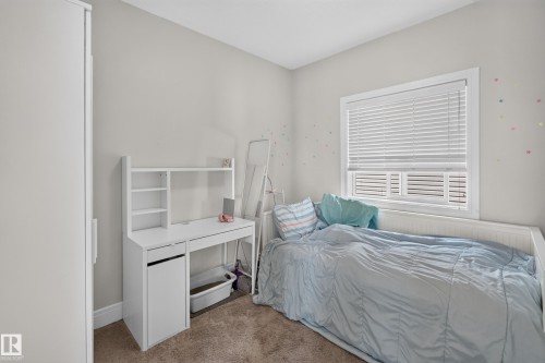 Carpeted flooring, white window blinds, and light-colored walls - 3685 Claxton Place Sw, Edmonton, AB 
