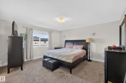 Carpeted flooring, recessed window, and overhead lighting fixture - 