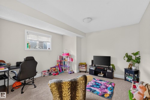 Carpeted flooring, recessed window, overhead flush-mount lighting, and neutral wall tones - 3685 Claxton Place Sw, Edmonton, AB 