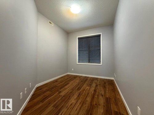 #128 10531 117 St Nw, Edmonton, AB - Indoor Photo Showing Other Room