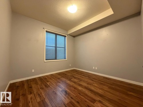 #128 10531 117 St Nw, Edmonton, AB - Indoor Photo Showing Other Room