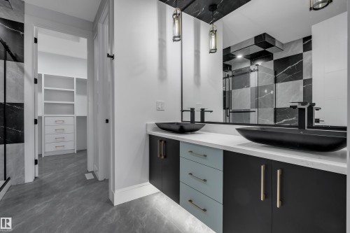 Dual vessel sinks with wall-mounted faucets - 4005 39 Street, Beaumont, AB - Indoor