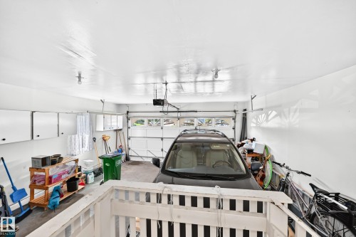 Built-in cabinetry, garage door with upper glass panels, overhead garage door opener - 4327 49 Street Nw, Edmonton, AB 