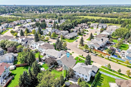 Residential neighborhood setting with mature trees and paved streets - 4327 49 Street Nw, Edmonton, AB 