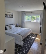 Wood-finish flooring with a flush-mount ceiling light - 