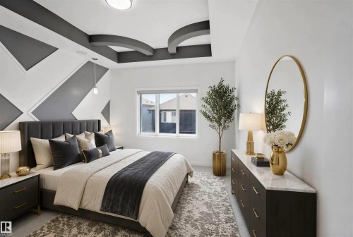 Recessed ceiling lighting, decorative tray ceiling, modern accent wall, window with roller shade, and built-in dresser with a stone countertop - 2027 13 Avenue Nw, Edmonton, AB 