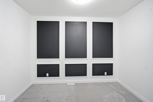 White walls with accent paneling - 2027 13 Avenue Nw, Edmonton, AB 