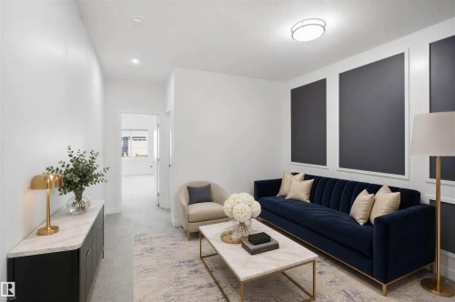 Recessed ceiling lighting, flush mount ceiling fixture, board and batten wall treatment, light tone flooring, white interior walls - 2027 13 Avenue Nw, Edmonton, AB 