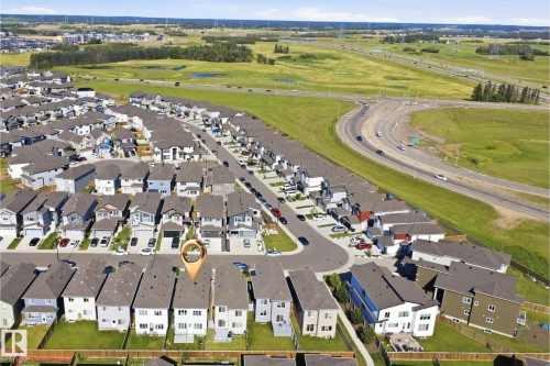 Residential neighborhood setting with multiple detached residences - 2027 13 Avenue Nw, Edmonton, AB 