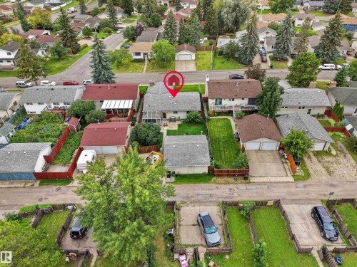 Single-family residence with an attached covered patio and a detached garage structure - 7435 32 Avenue Nw, Edmonton, AB 