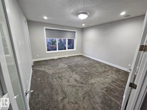 Large primary, 14-1/2' x 16', French Doors - Edmonton, AB 