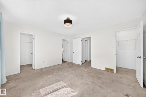 Recessed lighting, wall-to-wall carpeting, and multiple interior doors - #30 300 Hooper Cr Nw, Edmonton, AB 
