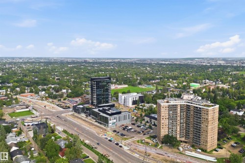 Aerial perspective showcasing surrounding urban landscape with multiple high-rise structures - #1115 13910 Stony Plain Rd Nw, Edmonton, AB 