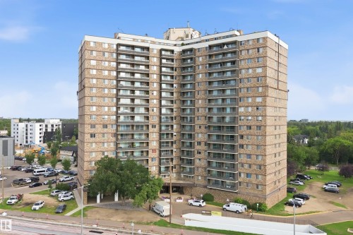 High-rise building with a brick facade and multiple balconies - #1115 13910 Stony Plain Rd Nw, Edmonton, AB 