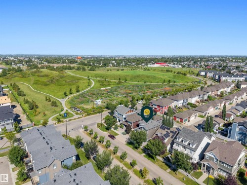 Aerial perspective showcasing a residential neighborhood with varied housing styles - 2585 Pegasus Boulevard Nw, Edmonton, AB 