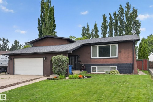 Split-level residence featuring a dark brown exterior with a black brick lower facade - 131 Pine Drive, Wetaskiwin, AB - Outdoor