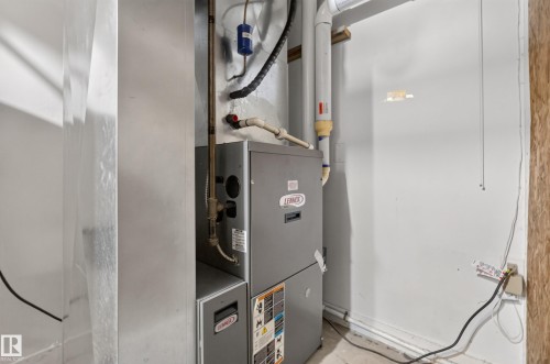 Lennox HVAC system with visible ductwork and piping - 131 Pine Drive, Wetaskiwin, AB - Indoor