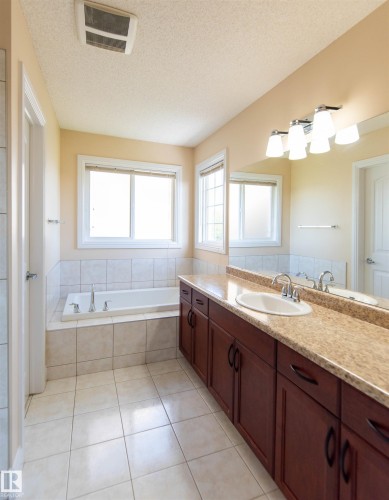 Tile flooring throughout - 1419 Chahley Place Nw, Edmonton, AB 