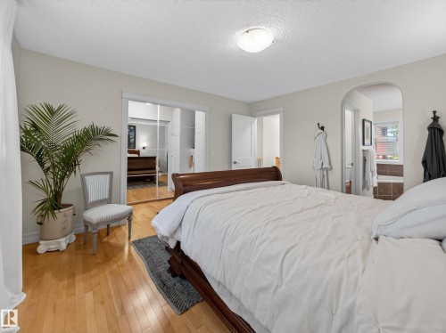 Wood-finish flooring throughout, providing a bright and cohesive aesthetic - 1223 Appleton Close, Sherwood Park, AB 