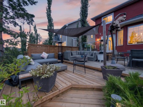 Expansive multi-level wood deck with a privacy fence - 1223 Appleton Close, Sherwood Park, AB 
