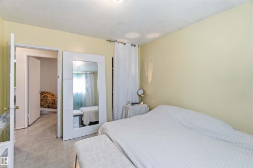 Tiled flooring in a light neutral tone - 13408 67 Street Nw, Edmonton, AB 