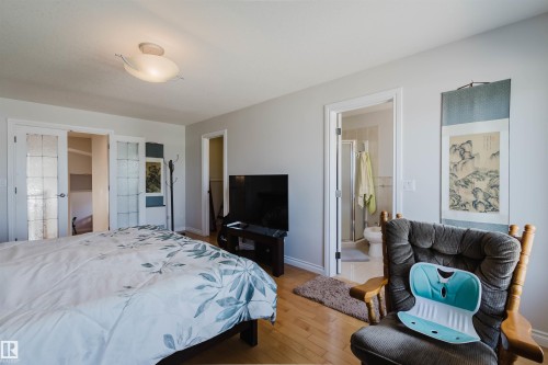 Hardwood-style flooring throughout - 8517 156 Avenue Nw, Edmonton, AB 