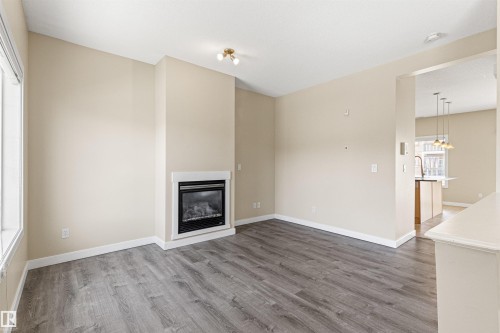 #39 13825 155 Av Nw, Edmonton, AB - Indoor Photo Showing Living Room With Fireplace